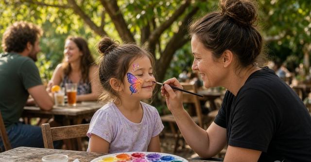 A girl getting a butterfly face painting